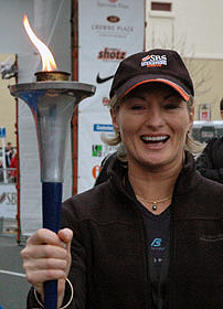 Allison Roe with the Peace Run Torch